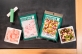 ファミリーマー・ショウワノートがコラボ お菓子な『オカシナ学習帳』発売　AR機能付きのパッケージ発売